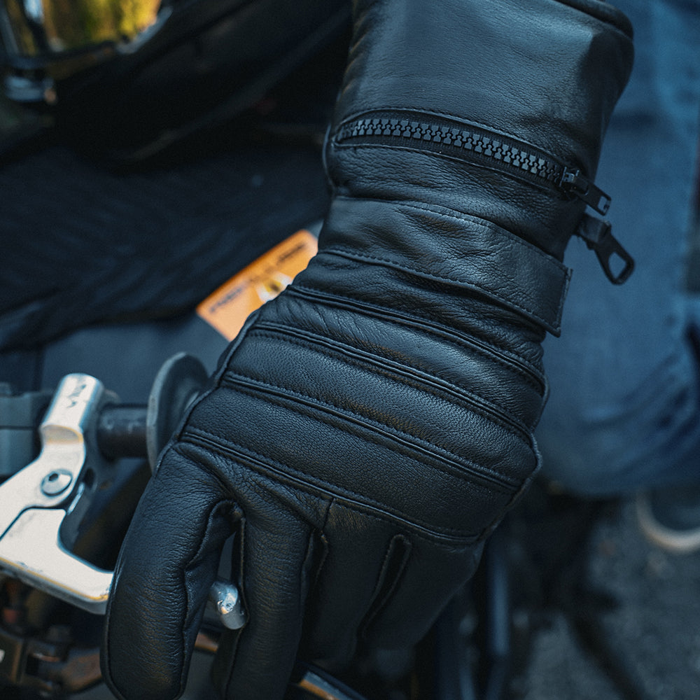 Crafted from premium cowhide leather, they feature a full gauntlet design for extended coverage.