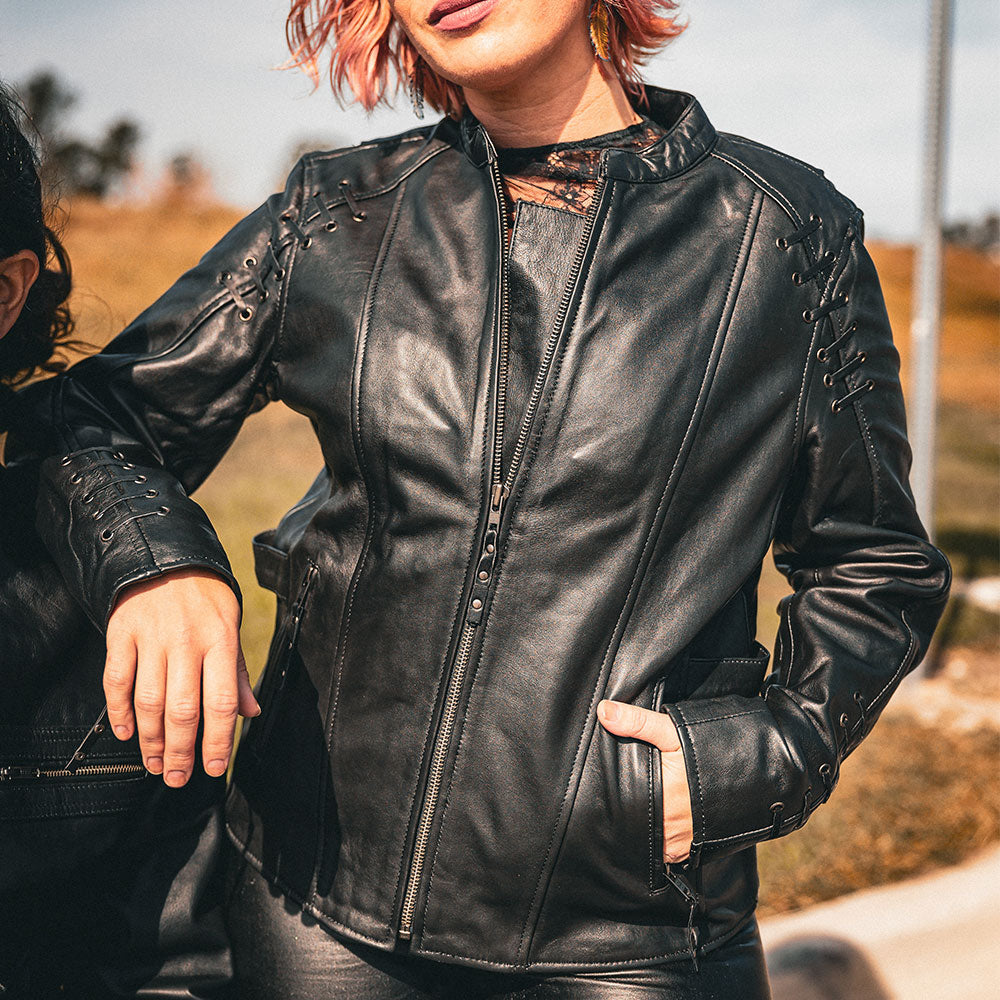 Crafted from luxurious lambskin leather in classic black, this jacket combines sophisticated design with practical features, making it an essential addition to your wardrobe