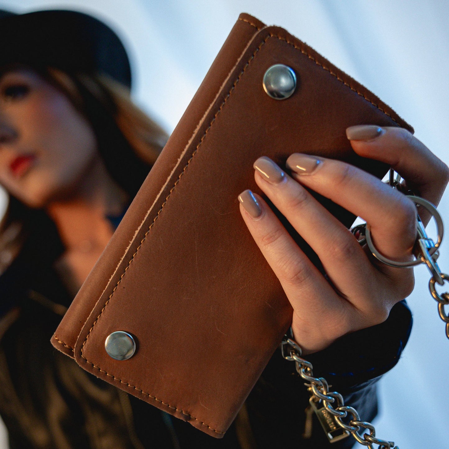 Ideal for motorcycle riders and enthusiasts, they offer multiple compartments for cards, cash, and coins, ensuring practicality on the go.