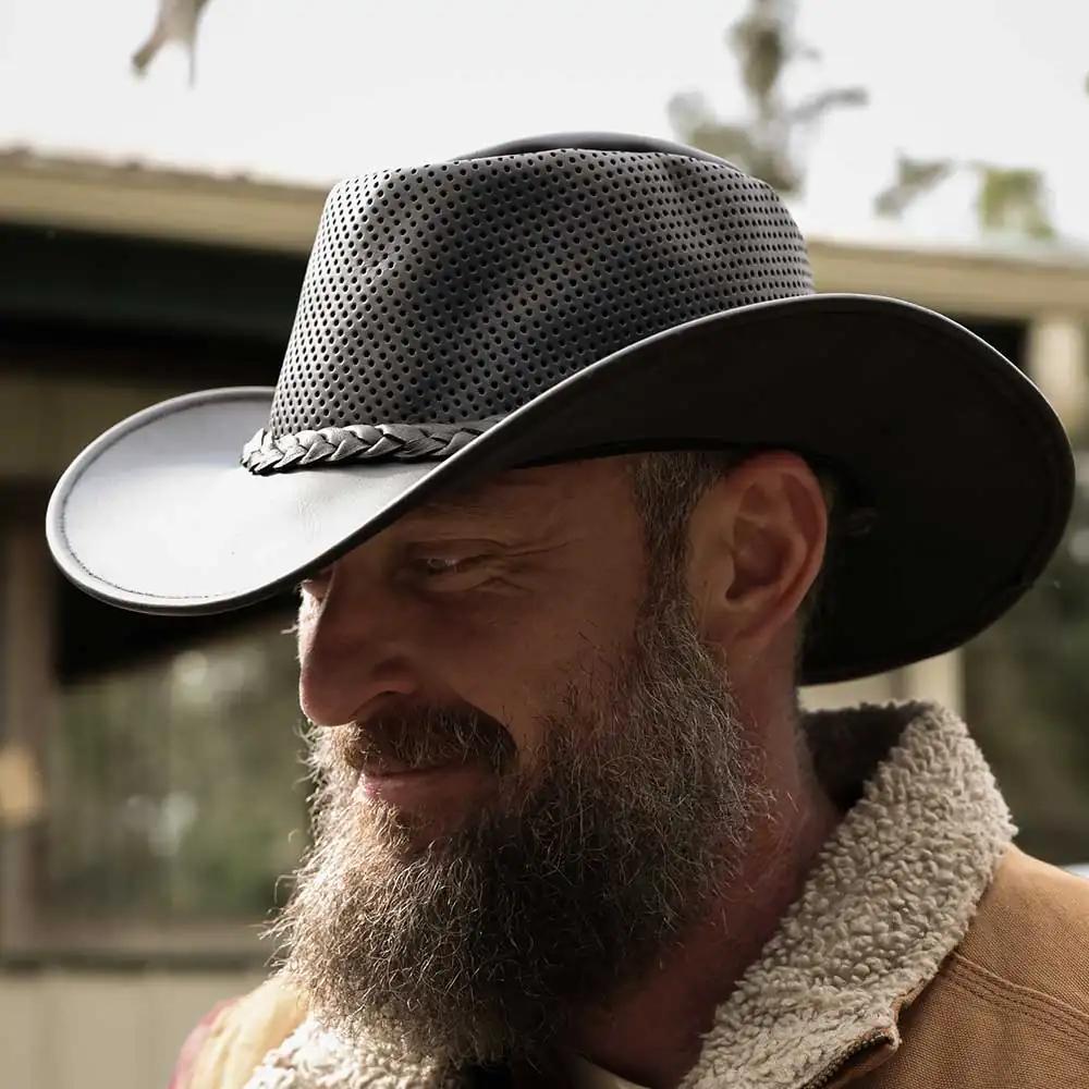 Embrace rugged elegance with the Men's Premium Cowhide Leather Cowboy Hat, designed to combine classic Western style with modern craftsmanship