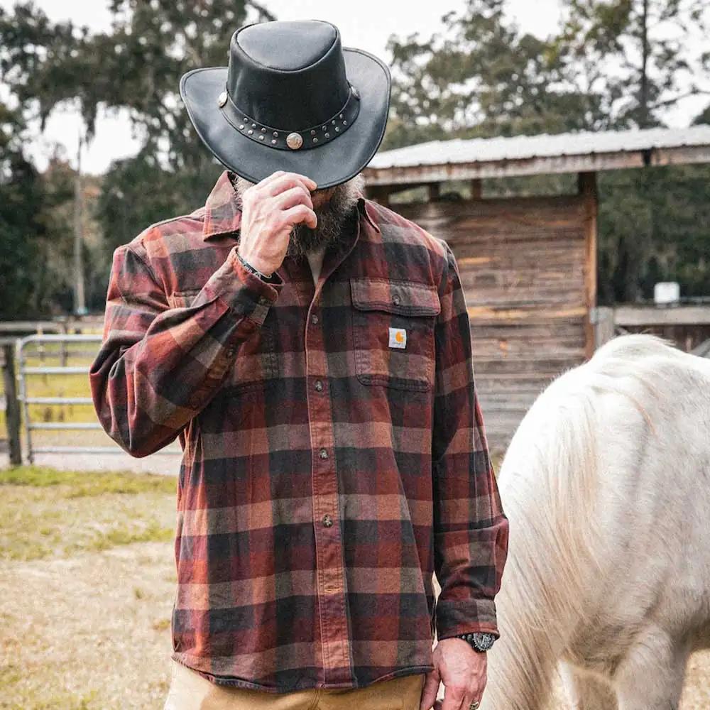 Embrace rugged elegance with the Premium Cowhide Leather Cowboy Hat, designed to combine classic Western style with modern craftsmanship