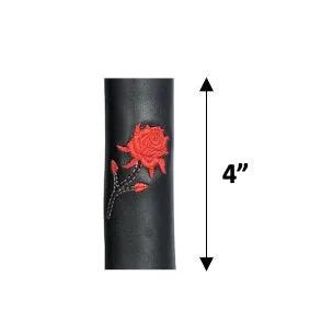 Black cylindrical object with a red rose