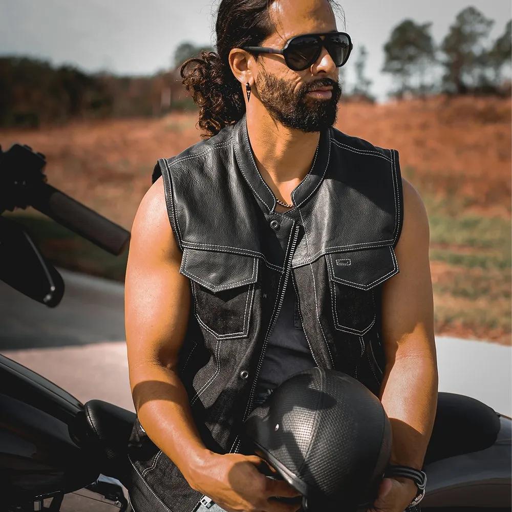 Man in leather vest and sunglasses lifestyle image