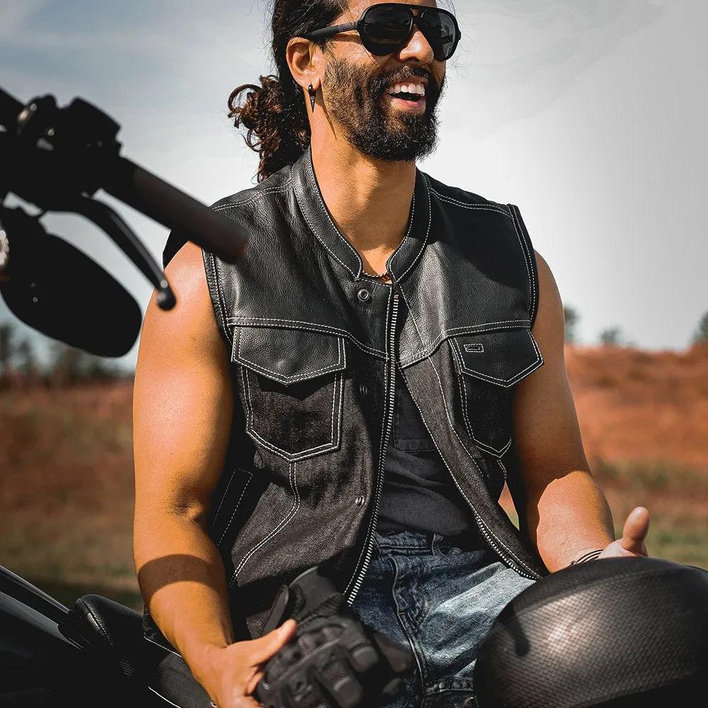 rider wearing a leather vest and sunglasses