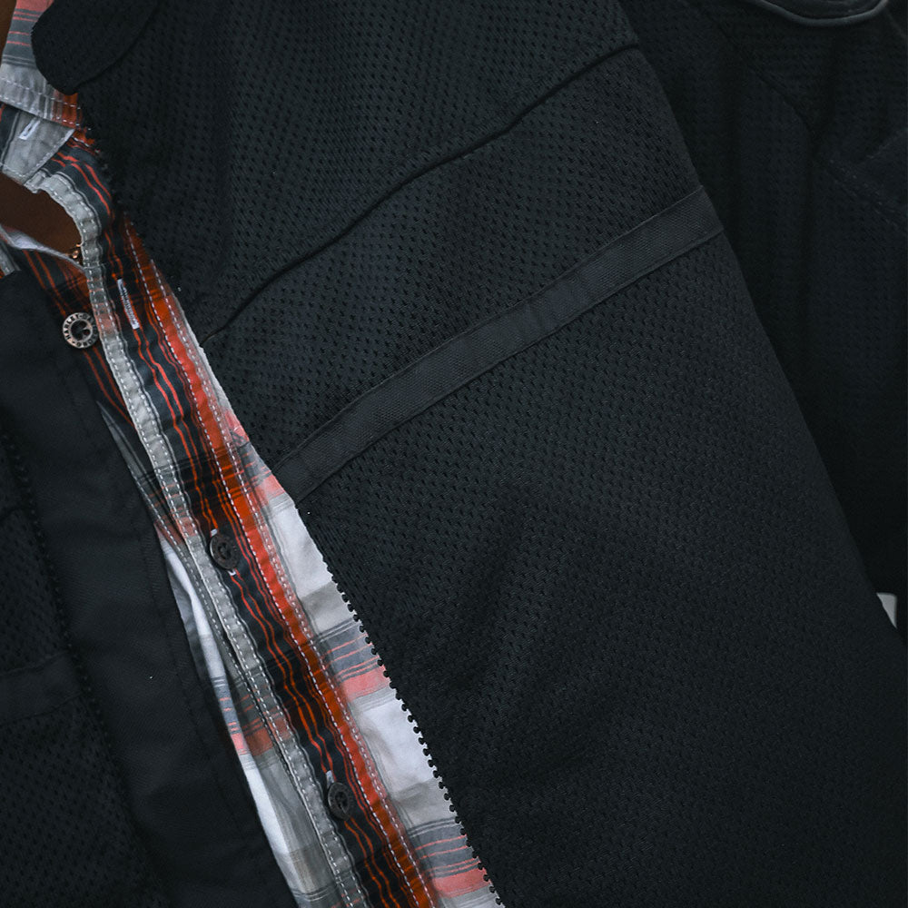 . Crafted from durable textile mesh, this jacket offers breathability and flexibility, making it suitable for various weather conditions and extended rides. It includes removable armor in the shoulders and elbows for impact protection, ensuring rider safety