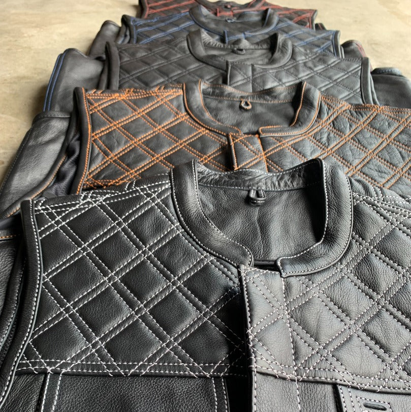 The Men's Diamond Stitch Club Vest by Unik Premium combines sophisticated design with practical features. Made from cowhide leather with a diamond stitch pattern.