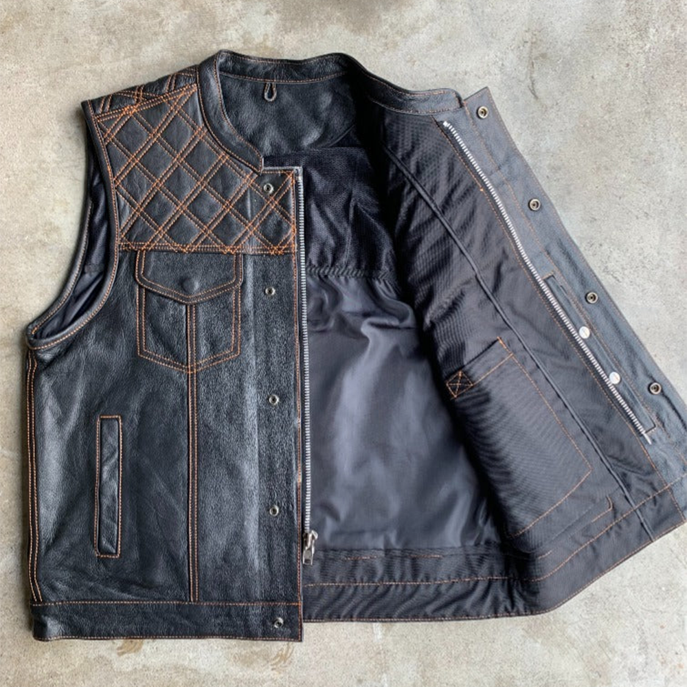 Made from cowhide leather with a diamond stitch pattern, it includes four exterior pockets, two inside concealed carry pockets.