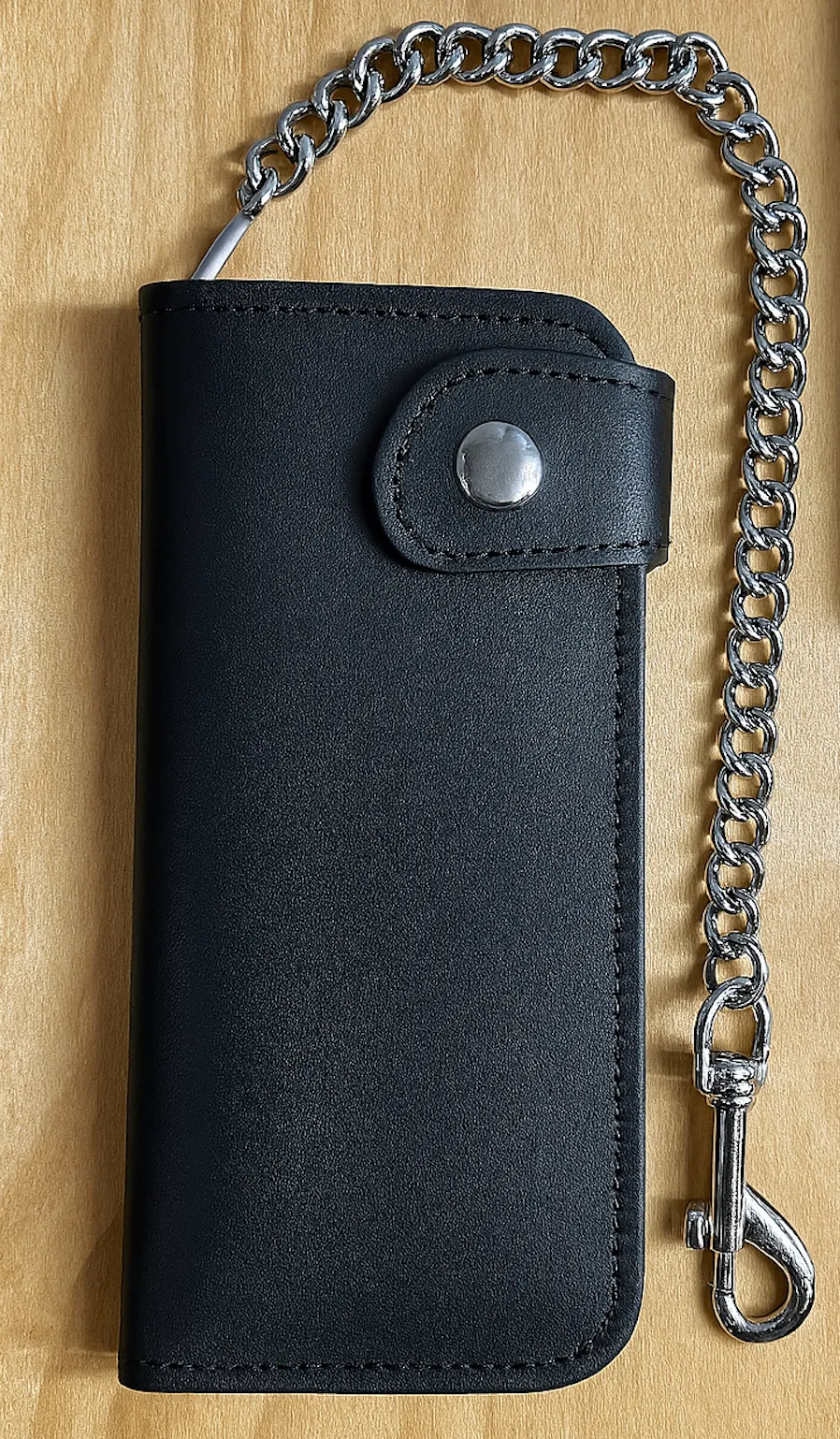 Black leather wallet with a chain