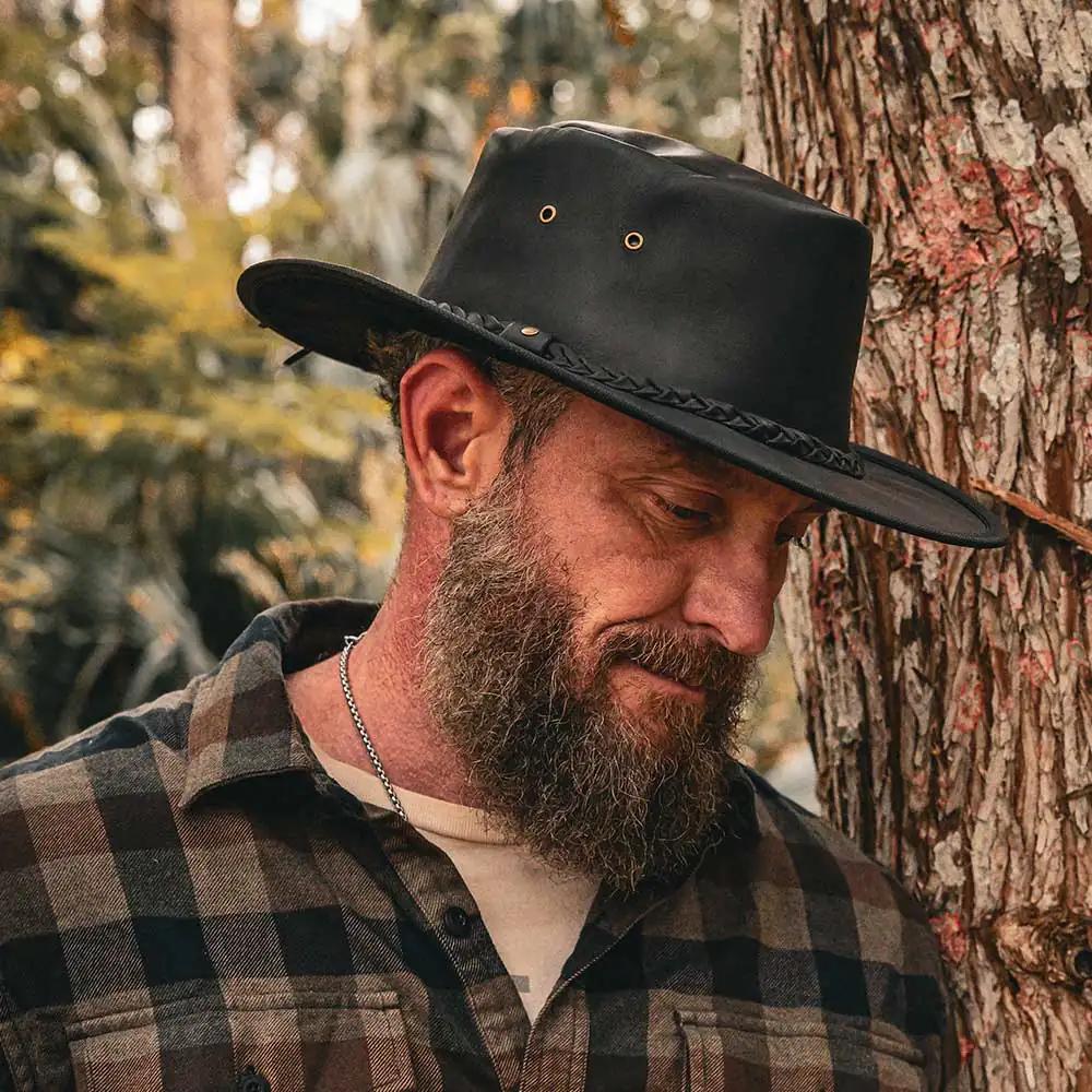 Embrace rugged elegance with the Men's Premium Cowhide Leather Cowboy Hat, designed to combine classic Western style with modern craftsmanship