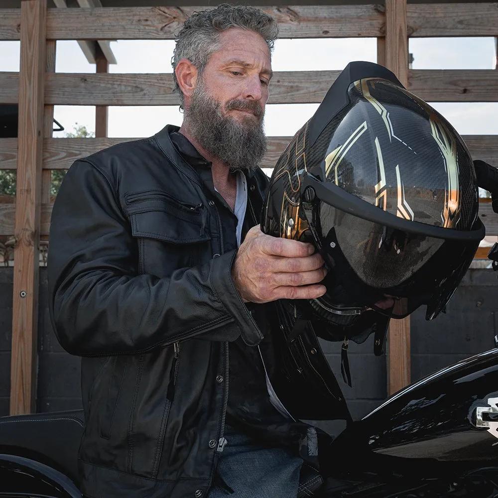 Man in leather jacket with helmet life style image