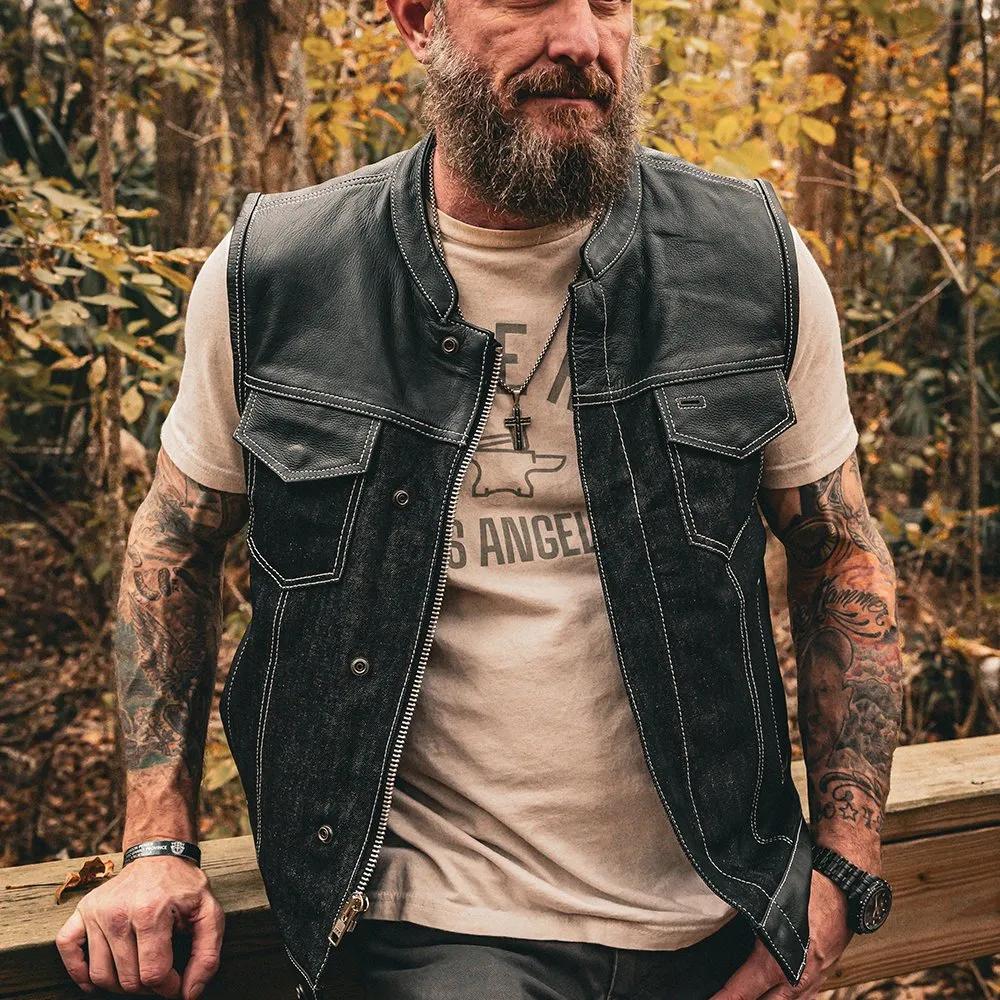 leather vest over a graphic t-shirt in a forest lifestyle image